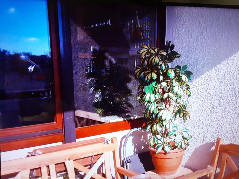 Loggia_mit_Kuechenfenster Wohnung Neus��